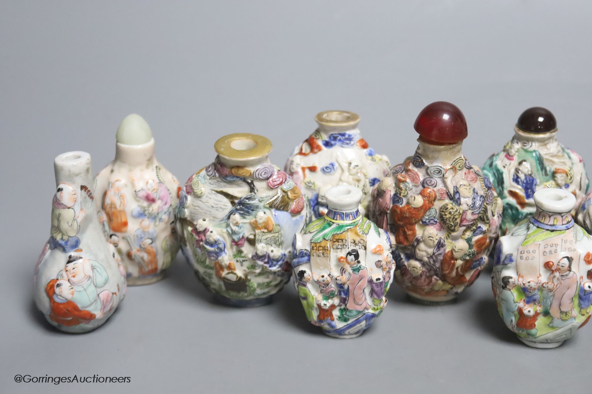 A collection of Chinese twelve famille rose snuff bottles